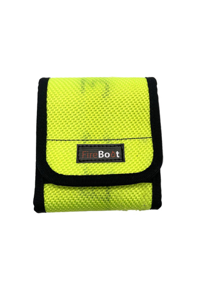 Schlüsseltasche L aus recyceltem Feuerwehrschlauch in Neongelb mit Schlüsselring.